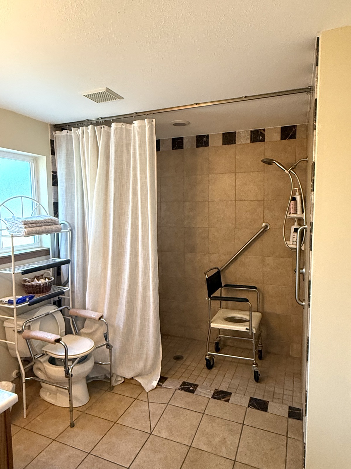 ADA-accessible roll-in shower with grab bars at Life Care Adult Family Home Vancouver WA
