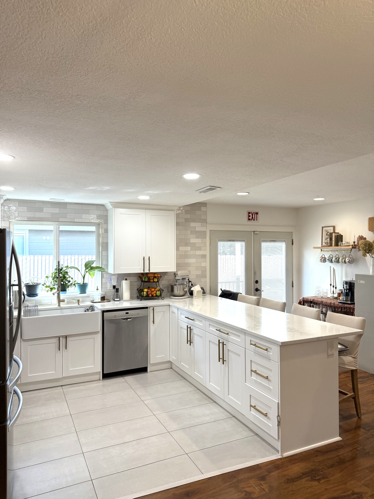 Modern kitchen with island and farmhouse sink at Life Care Adult Family Home Vancouver WA